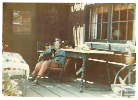 Nellie at home with her dog in 1961